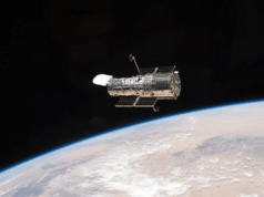 Hubble Image Shows Gravity Warping Distant Galaxies