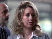 Pretend you’re sitting at Elizabeth Holmes’ desk on this weirdly detailed website